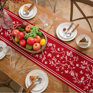 Traditional red table runner with floral jacquard bird patterns for festive decor
