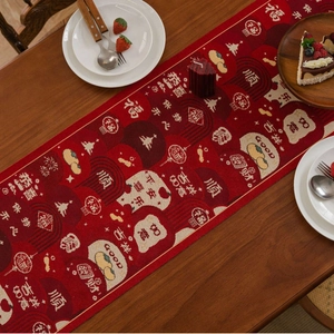 Chinese red jacquard table runner with auspicious patterns and festive gold embroidery