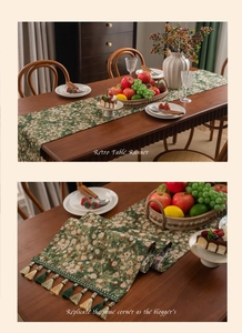 Detail of vintage green floral table runner featuring exquisite woven jacquard and tassels