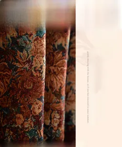 Detailed macro texture of heavy jacquard fabric with vintage orange floral patterns