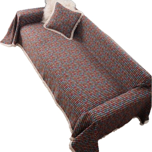Copridivano jacquard verde retrò con motivo floreale e frange decorative nappe