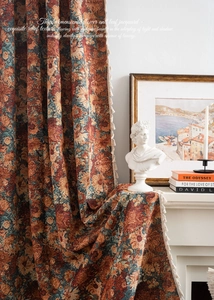 Detail of French jacquard curtain with 3D floral texture and elegant fringe edges