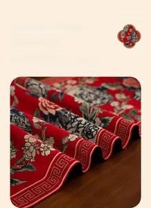 Close-up of jacquard table runner fabric with peony and blue porcelain patterns