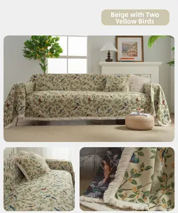Close-up of thick woven beige sofa cover with green leaf and oriole bird embroidery