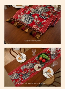 Close-up of red jacquard table runner with blue and white porcelain floral pattern and tassels