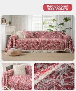 Detail of red coconut tree woven sofa cover with decorative fringes and matching cushion