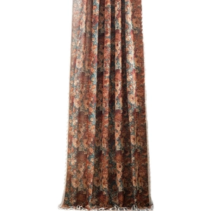 Vintage floral jacquard curtain in orange and brown with elegant fringe tassel details