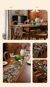 Macro detail of dark coffee jacquard table runner with peony patterns and fringe tassels