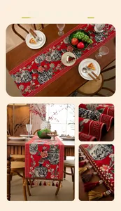 Detail of red table runner with traditional vase patterns and decorative tassels