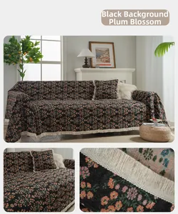 Detail of black plum blossom pattern jacquard sofa cover fabric with elegant tassels