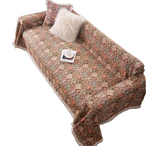 Housse de canapé jacquard rétro américain avec motif plume de paon et pompons décoratifs