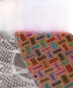 Close-up of geometric jacquard fabric with high density stitching and white lace trim