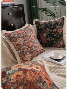 Detail of bohemian jacquard pillowcase with handmade beige tassels and durable fabric
