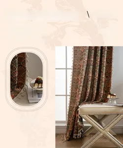 Detail showing vintage floral woven fabric curtain with elegant cream tassels decoration