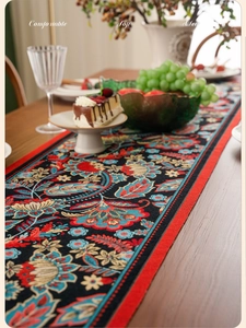 Close-up of retro jacquard table runner with floral embroidery on thick textured fabric