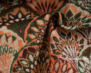 Detailed view of heavy jacquard fabric with vintage floral and geometric weave patterns
