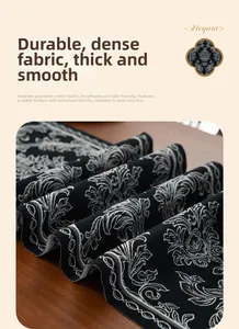 Detail of premium cotton-polyester table runner featuring black and white jacquard pattern