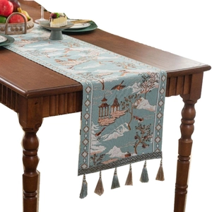Elegant Chinese landscape jacquard table runner with blue mountain patterns and silk tassels