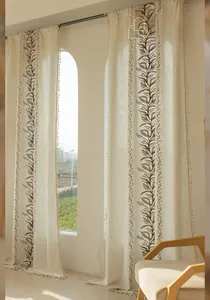 Detail of embroidered leaf pattern and tassel edge on American pastoral style curtains