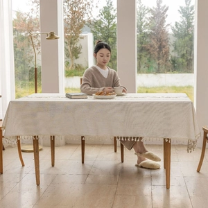 Minimalist cotton linen tablecloth with elegant fringe trim for dining table decoration