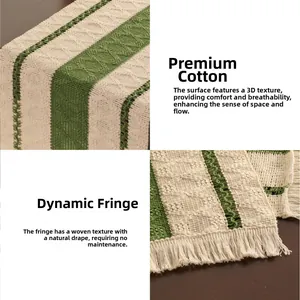 Close-up of premium cotton knitted table runner featuring green stripes and boho tassels