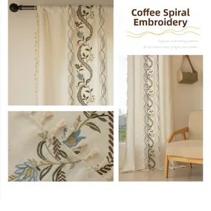 Detail of Nordic minimalist curtains with brown spiral embroidery and beige tassels