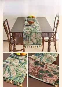 Detail of woven lotus pattern on table runner with decorative handmade tassels
