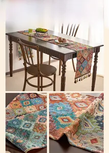 Macro shot of bohemian jacquard table runner with geometric patterns and tassel edges