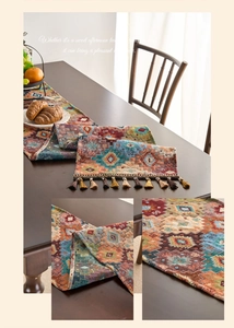 Detail of bohemian jacquard table runner featuring geometric patterns and fringe tassels