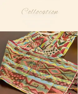 Detailed close-up of double-sided jacquard table runner with tribal geometric patterns