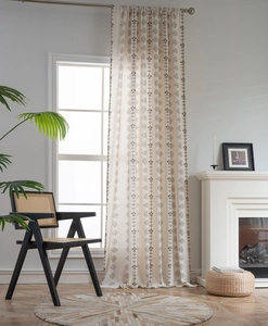 Detail of Nordic floral print curtain in beige linen texture for a natural home decor