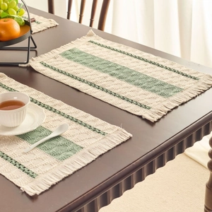 Nordic morandi green and cream woven table runner with decorative tassels for dining decor