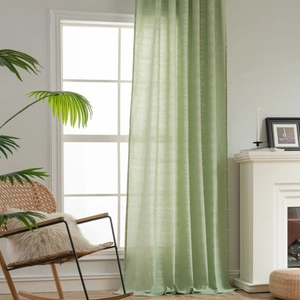 Sage green semi-blackout curtains with white floral print for a cozy balcony setting