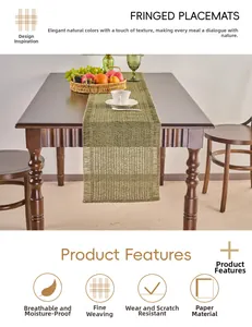 Close-up of green woven paper table runner with decorative fringe texture and tassels