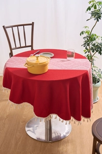 Red cotton linen round tablecloth with white geometric runner and elegant cream tassels