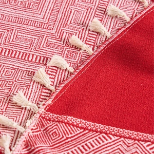 Red and white cotton linen tablecloth with geometric diamond patterns and fringe trim