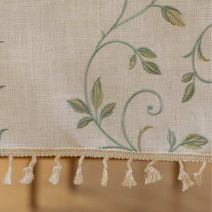Rectangular cotton linen tablecloth with botanical embroidery and tassel fringe details