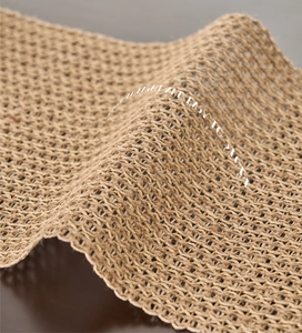 Macro detail of natural beige woven texture showing lightweight and foldable structure