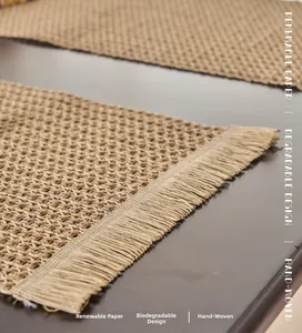 Macro detail of hand-woven eco-friendly table runner with dense tassel fringe texture