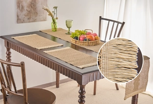 Detail of natural woven placemat with tassels showing high-quality jute fiber texture