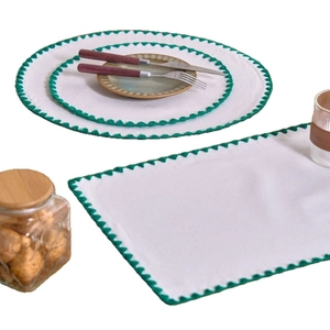 Nordic minimalist white fabric placemat set with elegant green wavy embroidery edges