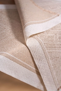 Macro shot of Nordic jacquard placemat showing detailed geometric patterns and soft texture