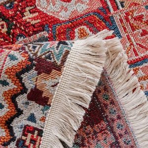 Bohemian geometric woven sofa cover with tassels in red and navy blue jacquard style
