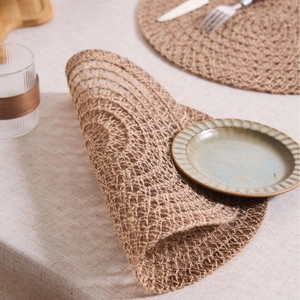 Natural jute woven round placemat with heat resistance for rustic dining table decor
