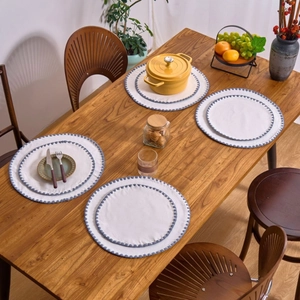 Set of 8 white round fabric placemats with blue scalloped edges for dining table decor