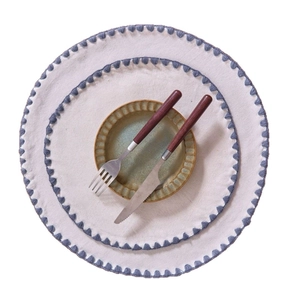 American pastoral round placemat set with off-white fabric and grey pom-pom lace edge