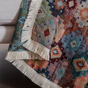 Bohemian geometric jacquard sofa cover throw with thick woven texture and cream tassels