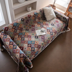 Thick bohemian sofa throw blanket with geometric jacquard patterns and white tassels