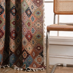 Bohemian geometric jacquard curtains with vibrant colors and elegant white tassels