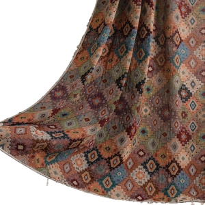 Retro geometric jacquard knit blanket with luxury diamond pattern and fringed edges